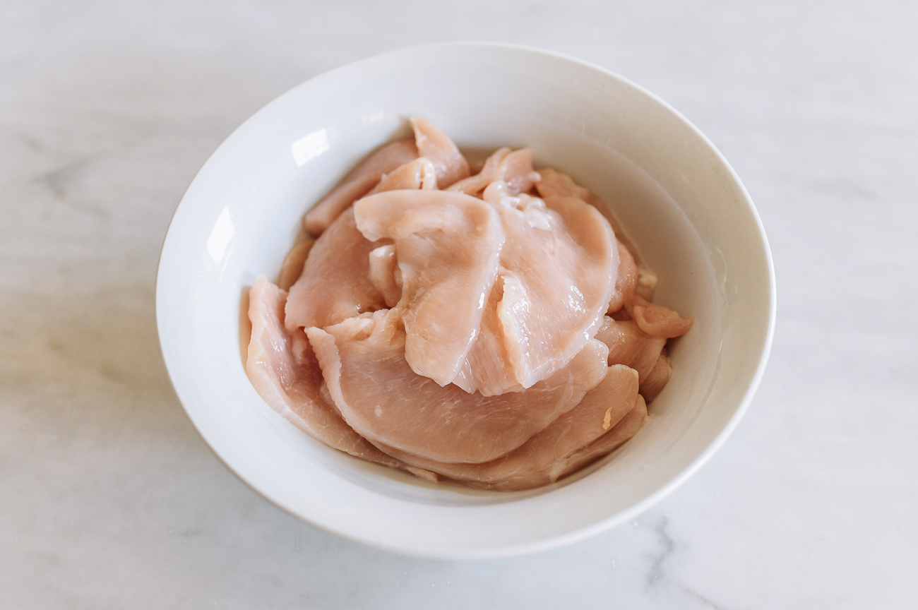 Sliced chicken in bowl