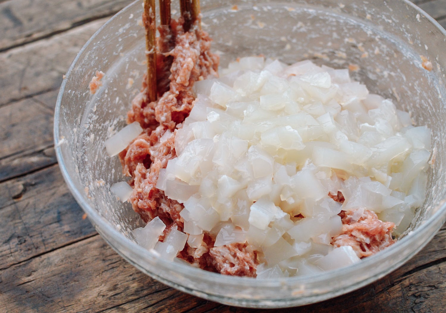 Mixing pork and aspic to make filling, by geagle.miooashdv.tk
