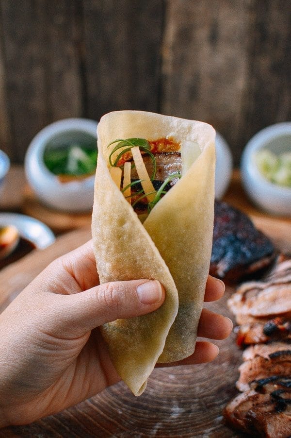 Holding a peking duck pancake, by geagle.miooashdv.tk
