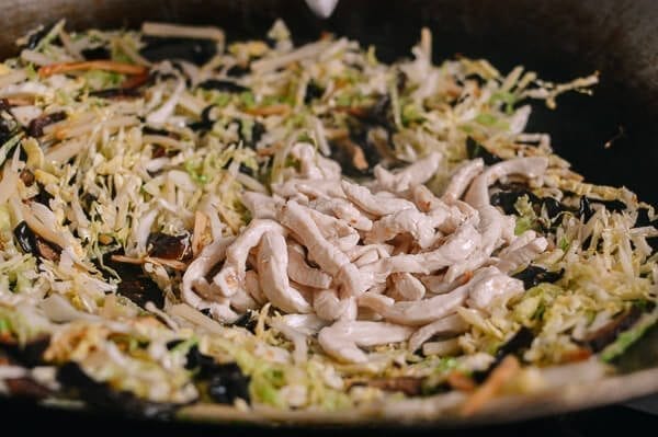 Adding pre-cooked chicken back to wok of vegetables, by geagle.miooashdv.tk