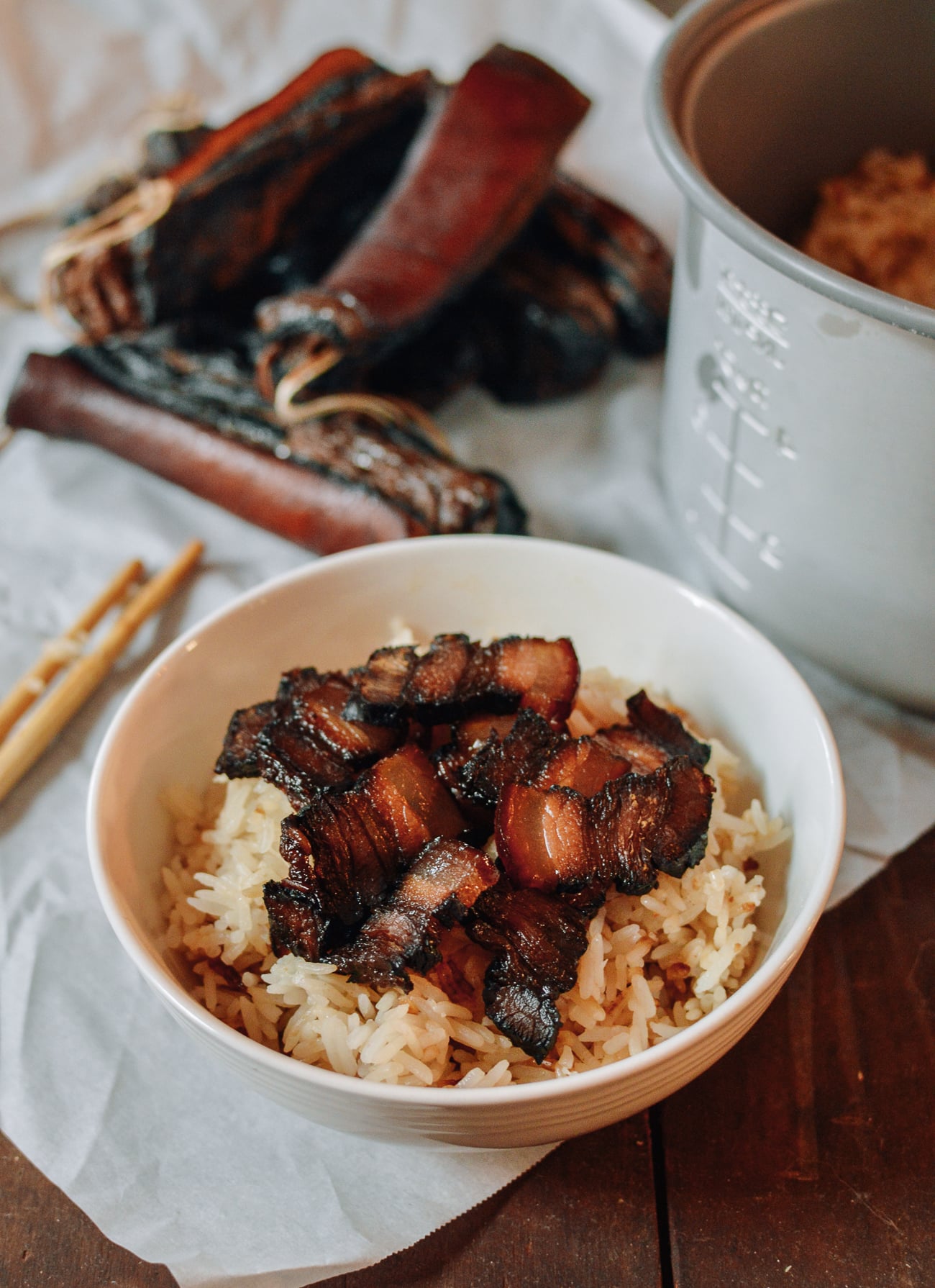 Sliced Chinese cured pork belly over rice
