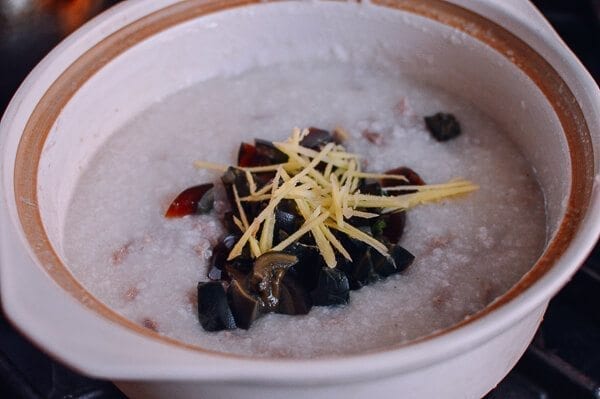 Adding ginger and thousand year old egg to congee, by geagle.miooashdv.tk