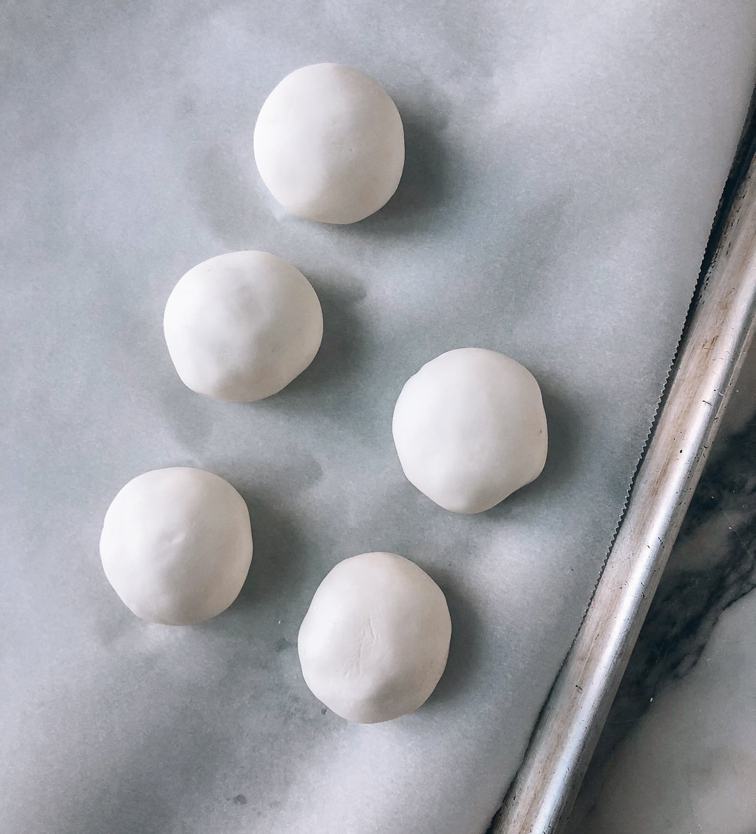uncooked Savory Tang Yuan sitting on parchment paper, by geagle.miooashdv.tk