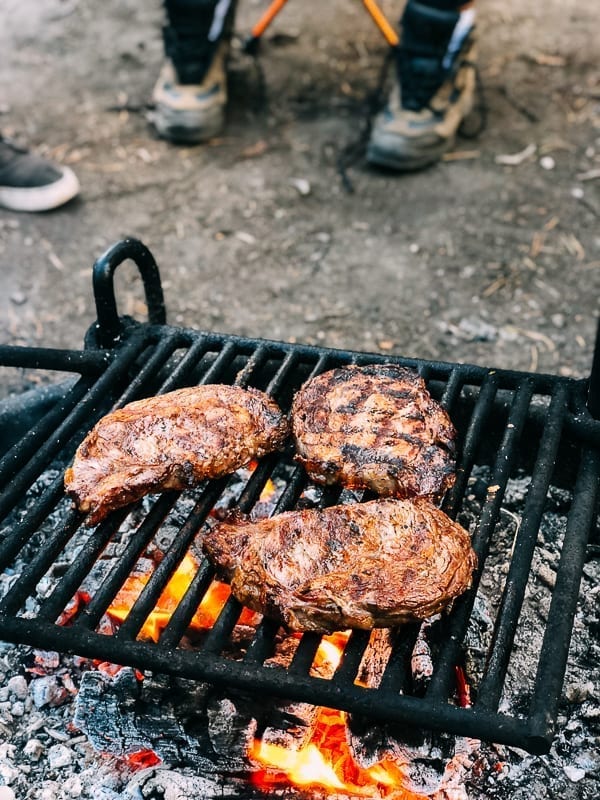 Grilling steak on campground grill, geagle.miooashdv.tk