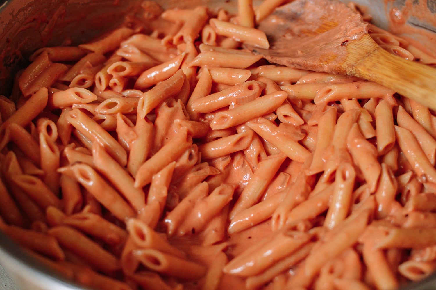 Stirring pasta into vodka sauce, geagle.miooashdv.tk