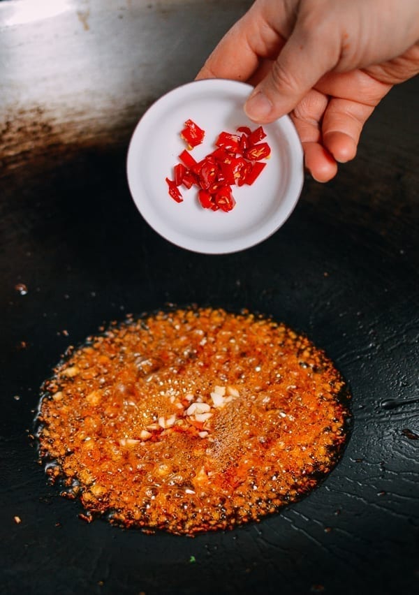 Adding chilies to wok, geagle.miooashdv.tk