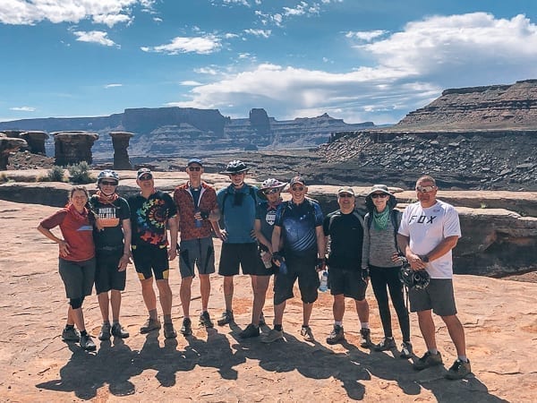 Musselman Arch Rim Tours Mountain Biking tour group photo by geagle.miooashdv.tk