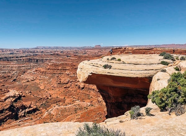 scenic view of hiker near white crack on White rim trail in Canyonlands by geagle.miooashdv.tk
