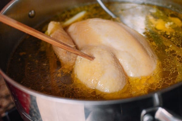 Poking chopstick into chicken to check for doneness, geagle.miooashdv.tk