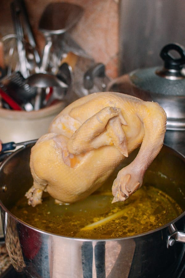 Lifting chicken out of pot, geagle.miooashdv.tk