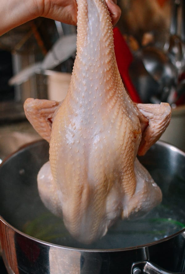 Lowering chicken into the pot, geagle.miooashdv.tk