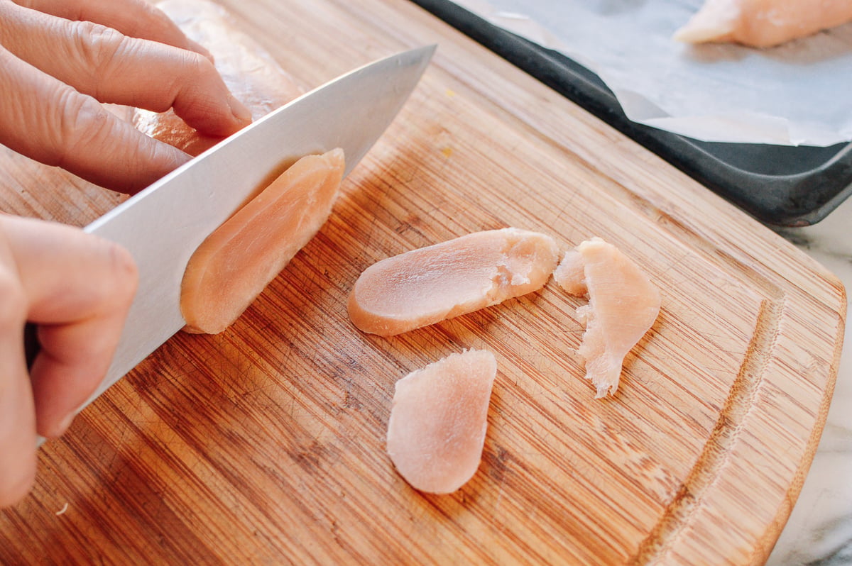 Slicing partially frozen chicken breast, geagle.miooashdv.tk
