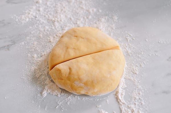 Dividing dough in half, geagle.miooashdv.tk