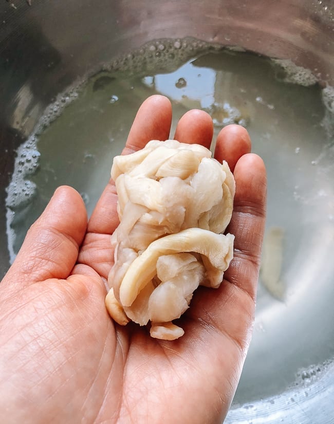 Squeezing water out of the dried daikon, geagle.miooashdv.tk