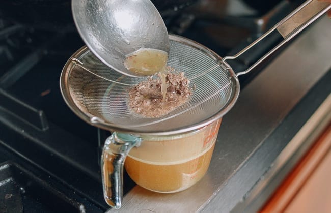 Straining pork stock, geagle.miooashdv.tk