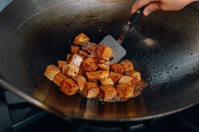 Stirring tofu in sauce, geagle.miooashdv.tk