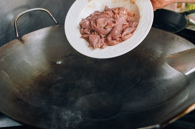 Adding pork to wok, geagle.miooashdv.tk