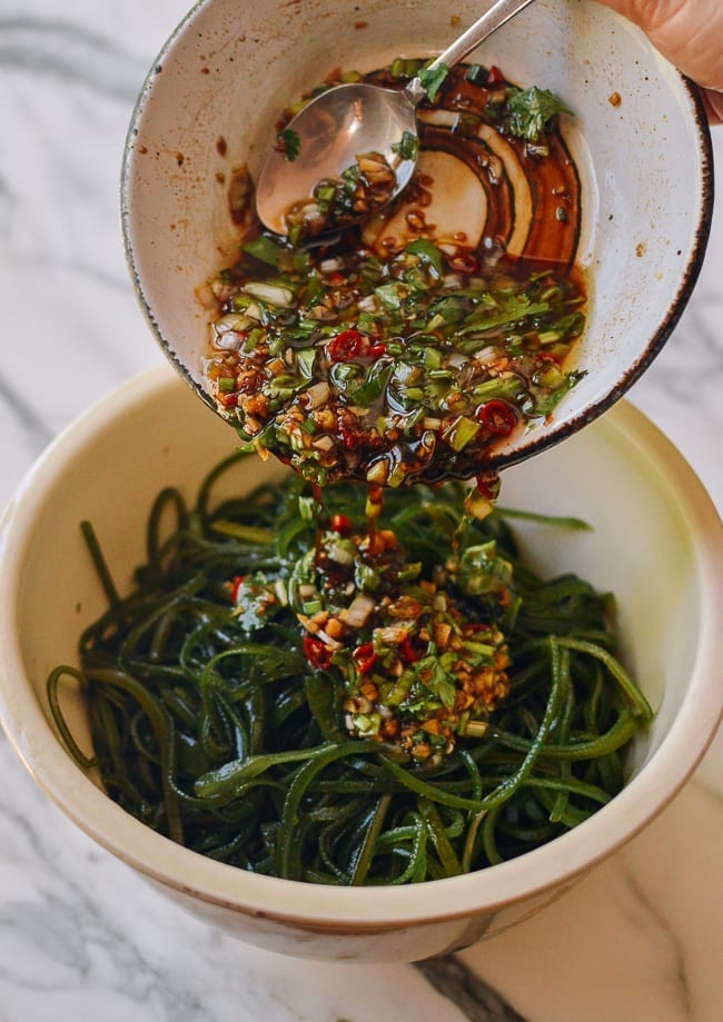 Pouring dressing over seaweed, geagle.miooashdv.tk