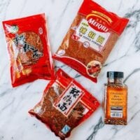 Sichuan chili flakes next to regular crushed red pepper, geagle.miooashdv.tk