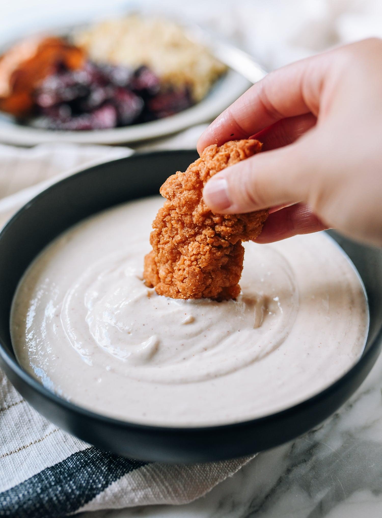 Dipping chicken finger into tofu garlic aioli, geagle.miooashdv.tk