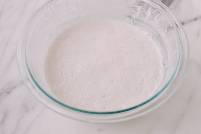 Bubbles on fermented rice flour, sugar, water, and yeast mixture, geagle.miooashdv.tk