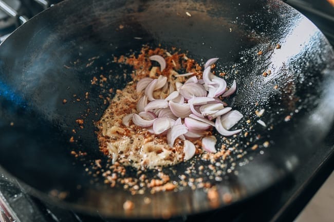 Adding shallots to wok, geagle.miooashdv.tk