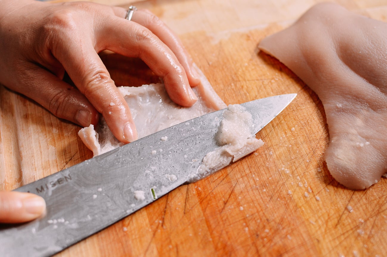 Scraping fat off of blanched pork skin, geagle.miooashdv.tk