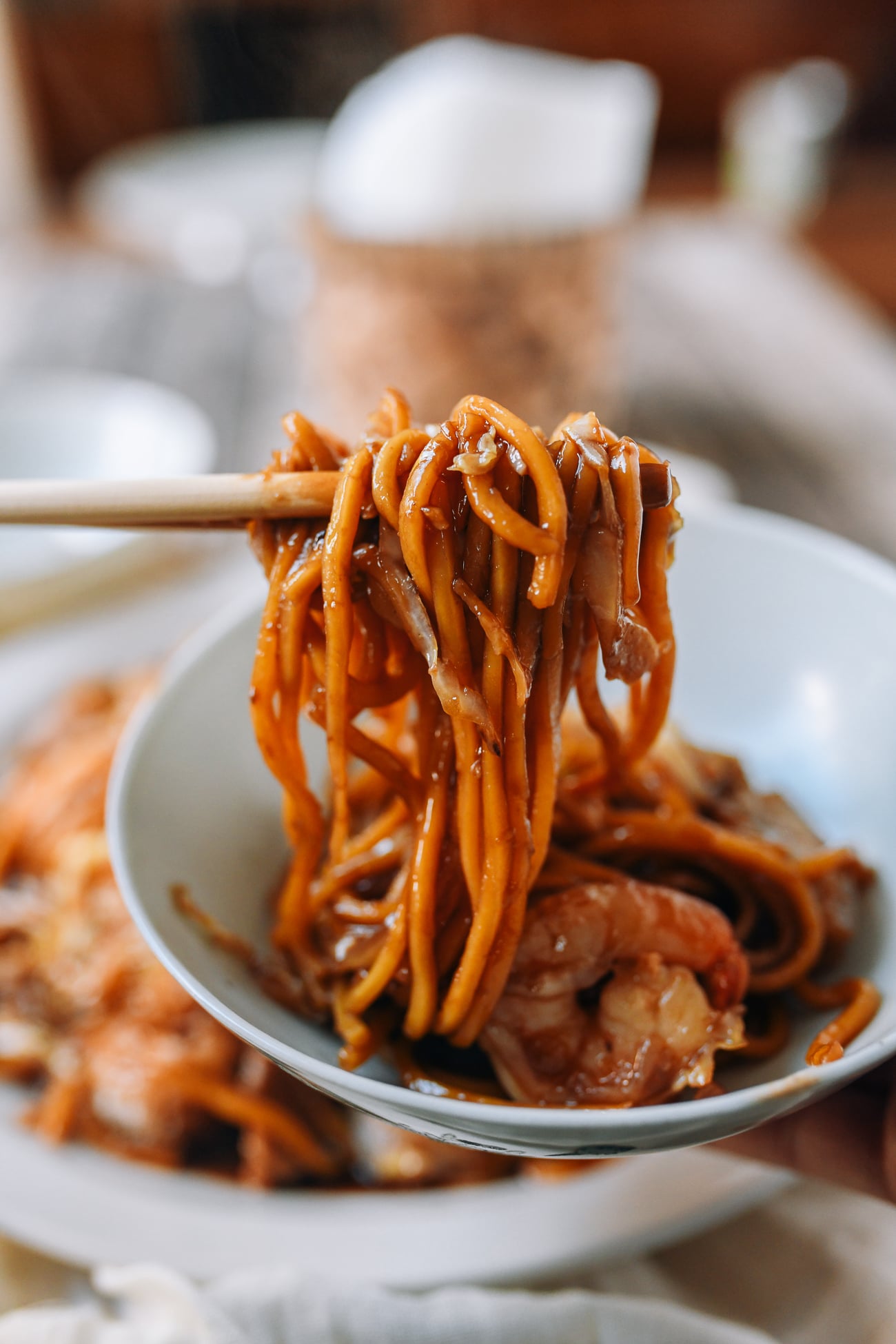 Picking up Malaysian Hokkien Mee with chopsticks