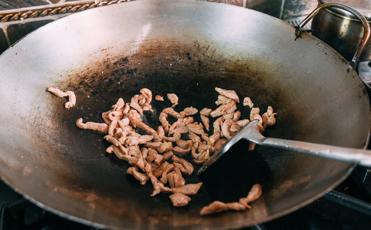 Seared pork in wok
