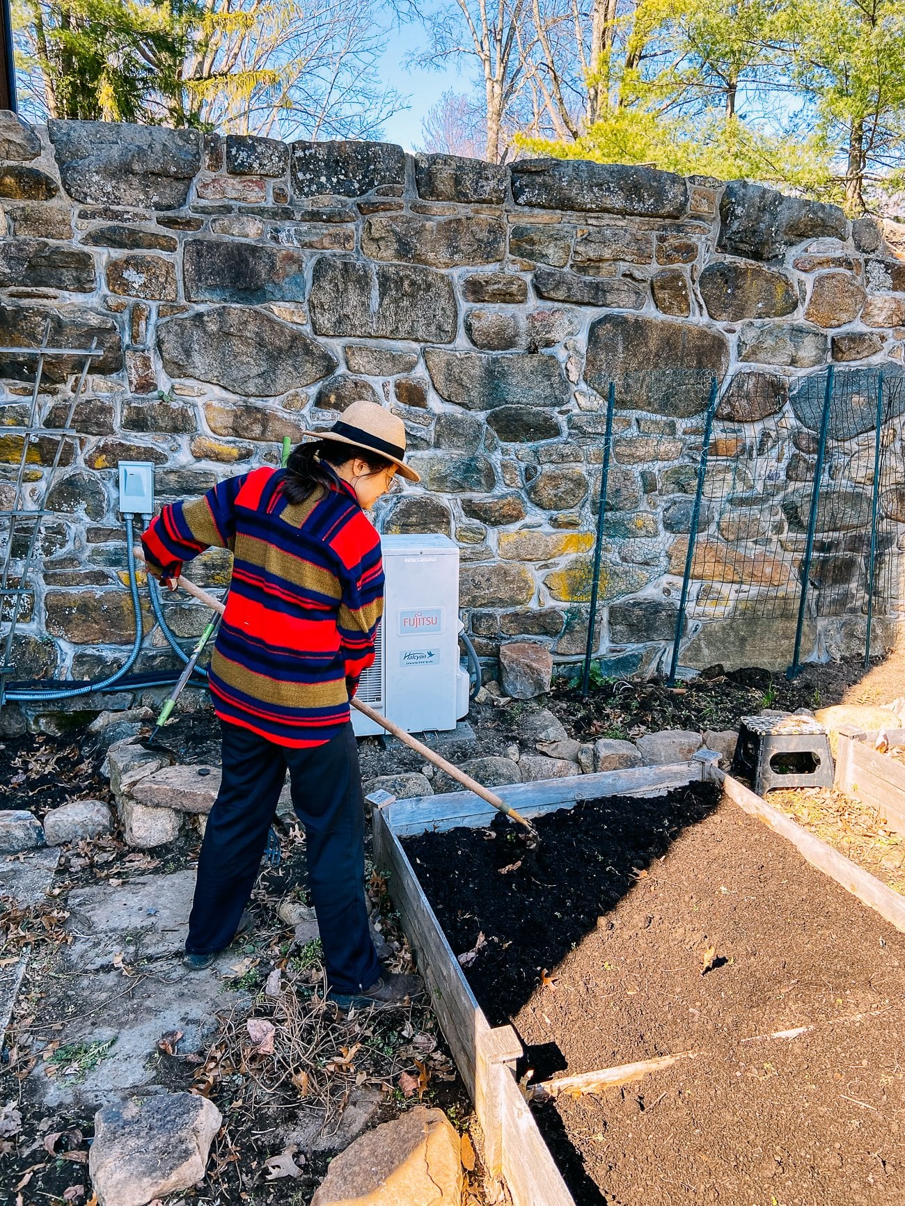 judy weeding raised bed