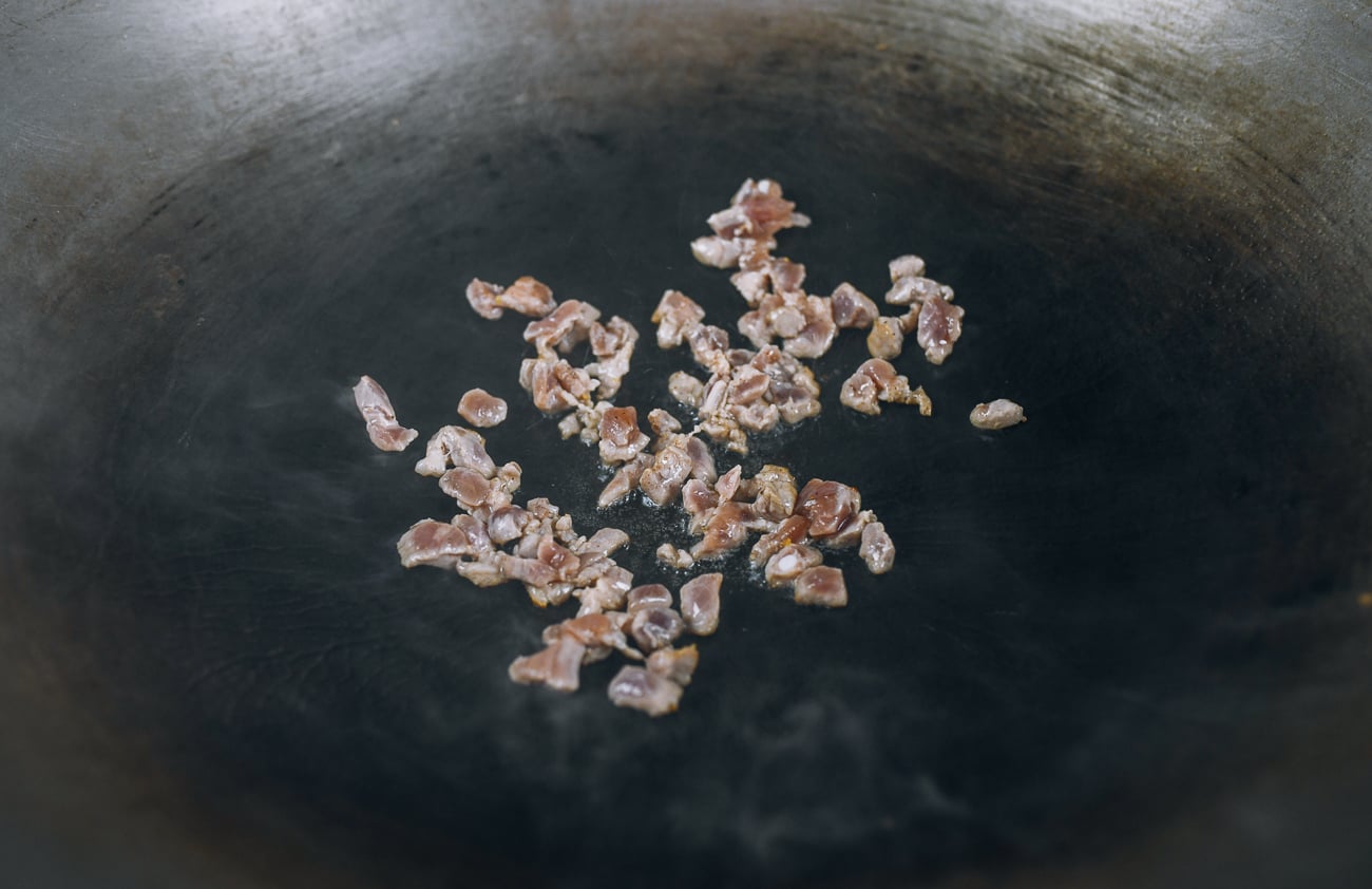 cooking pork belly in wok
