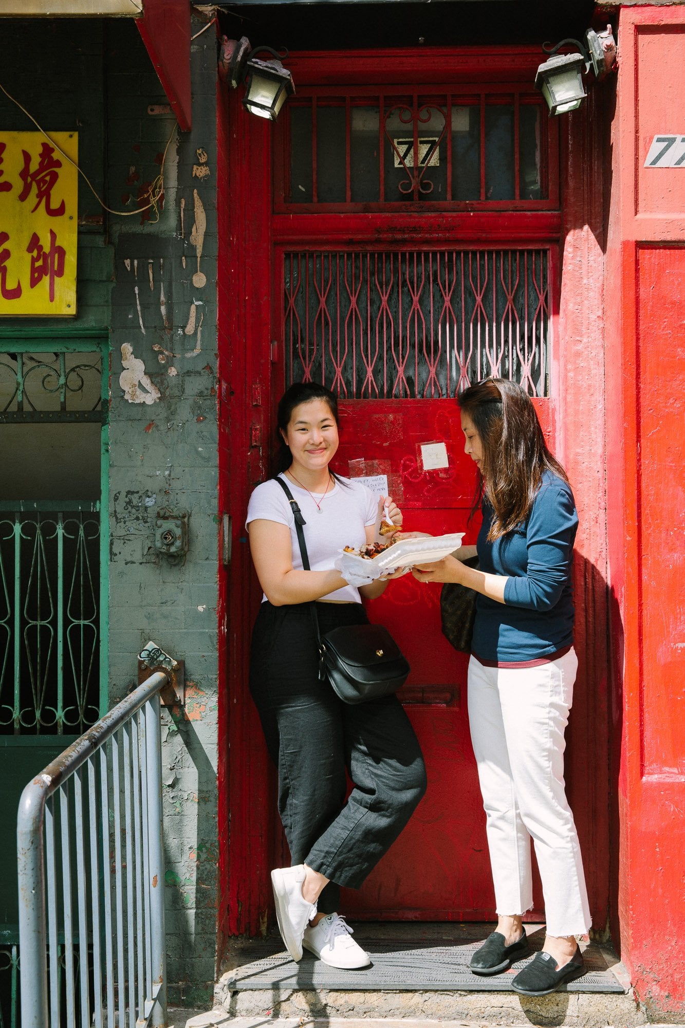 Sarah and Judy eating in Chinatown
