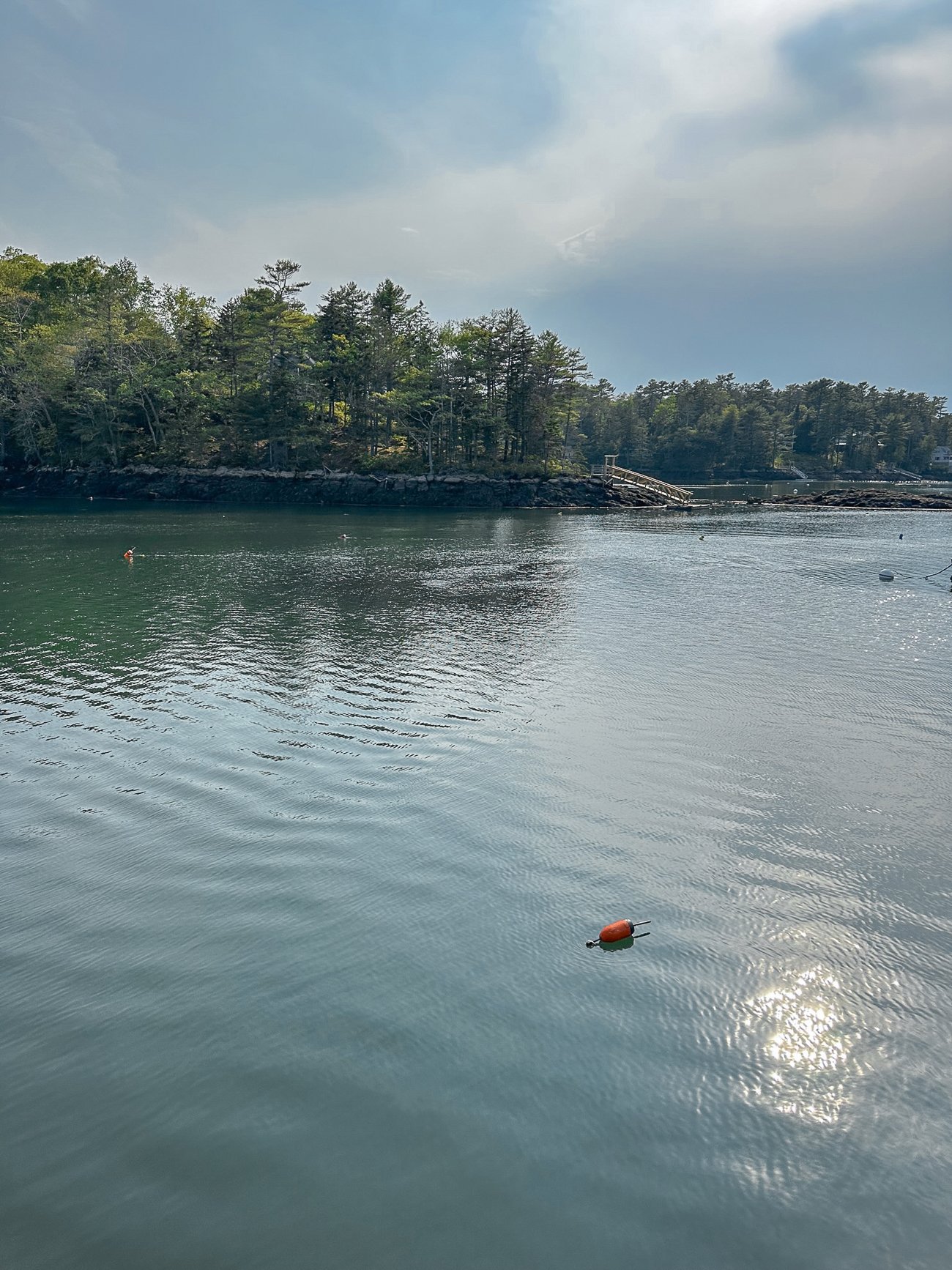 Sun glinting off the water in Southport, Maine