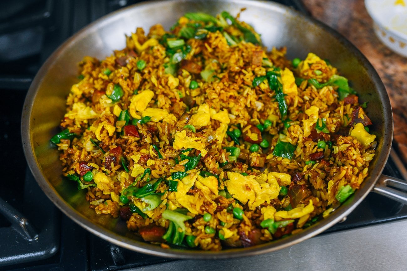 cooking fried rice in a frying pan or skillet