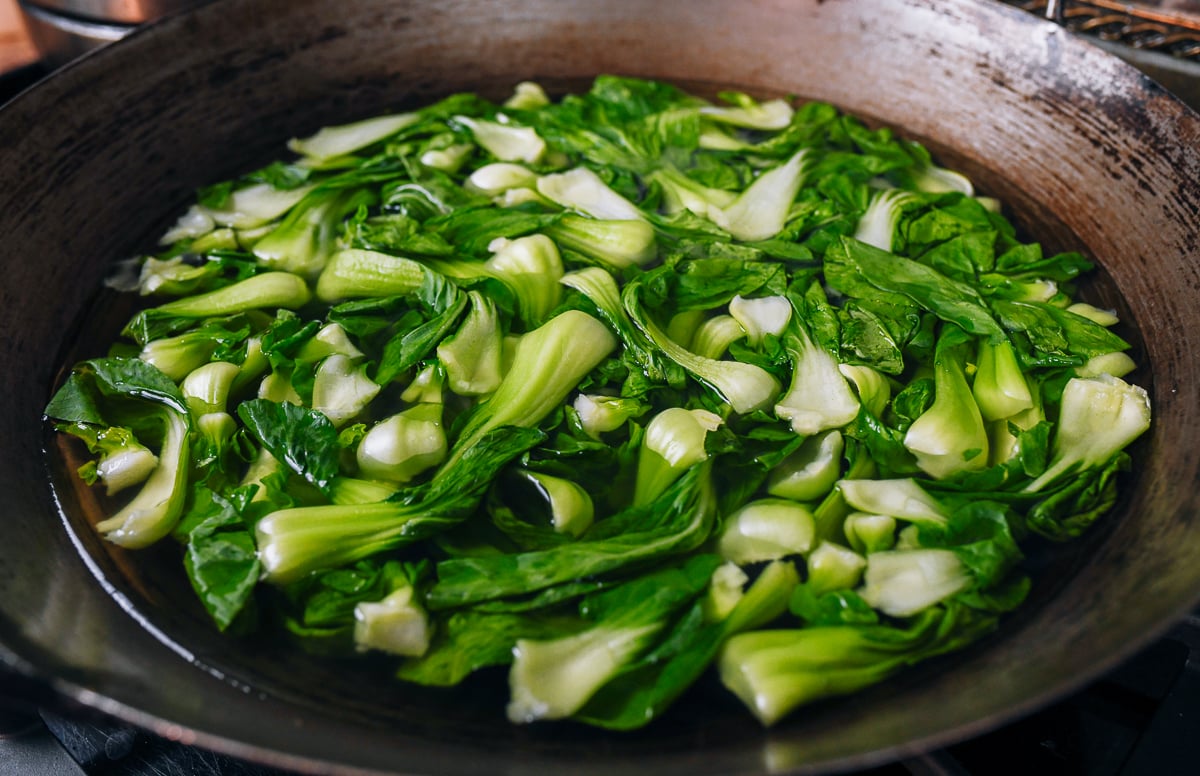 blanching bok choy in the wok