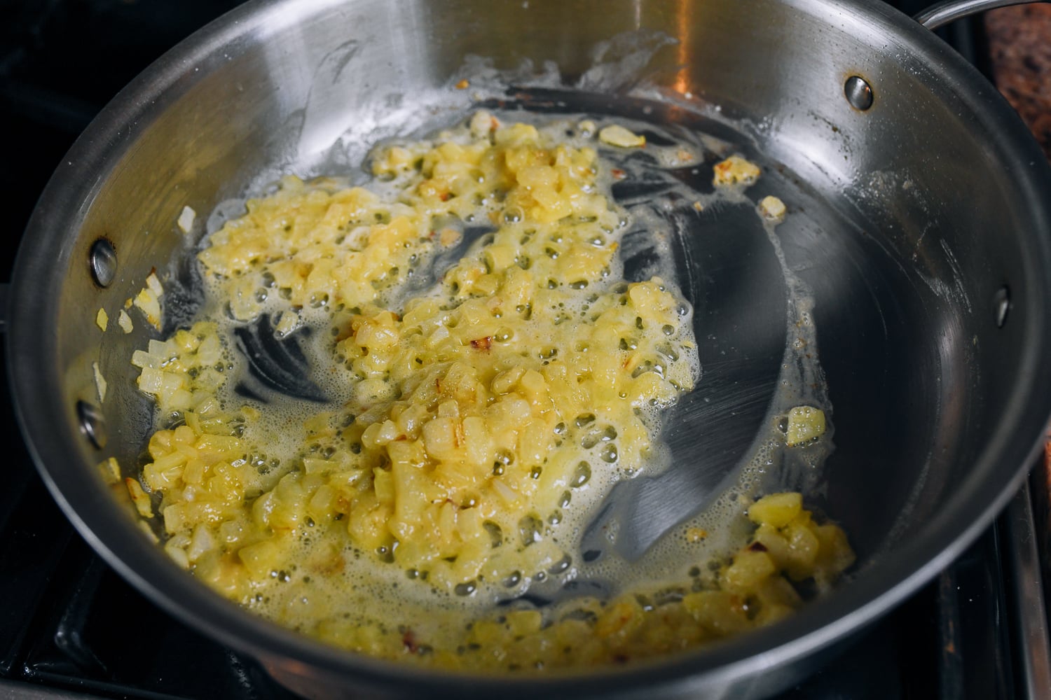 roux with onions in pan