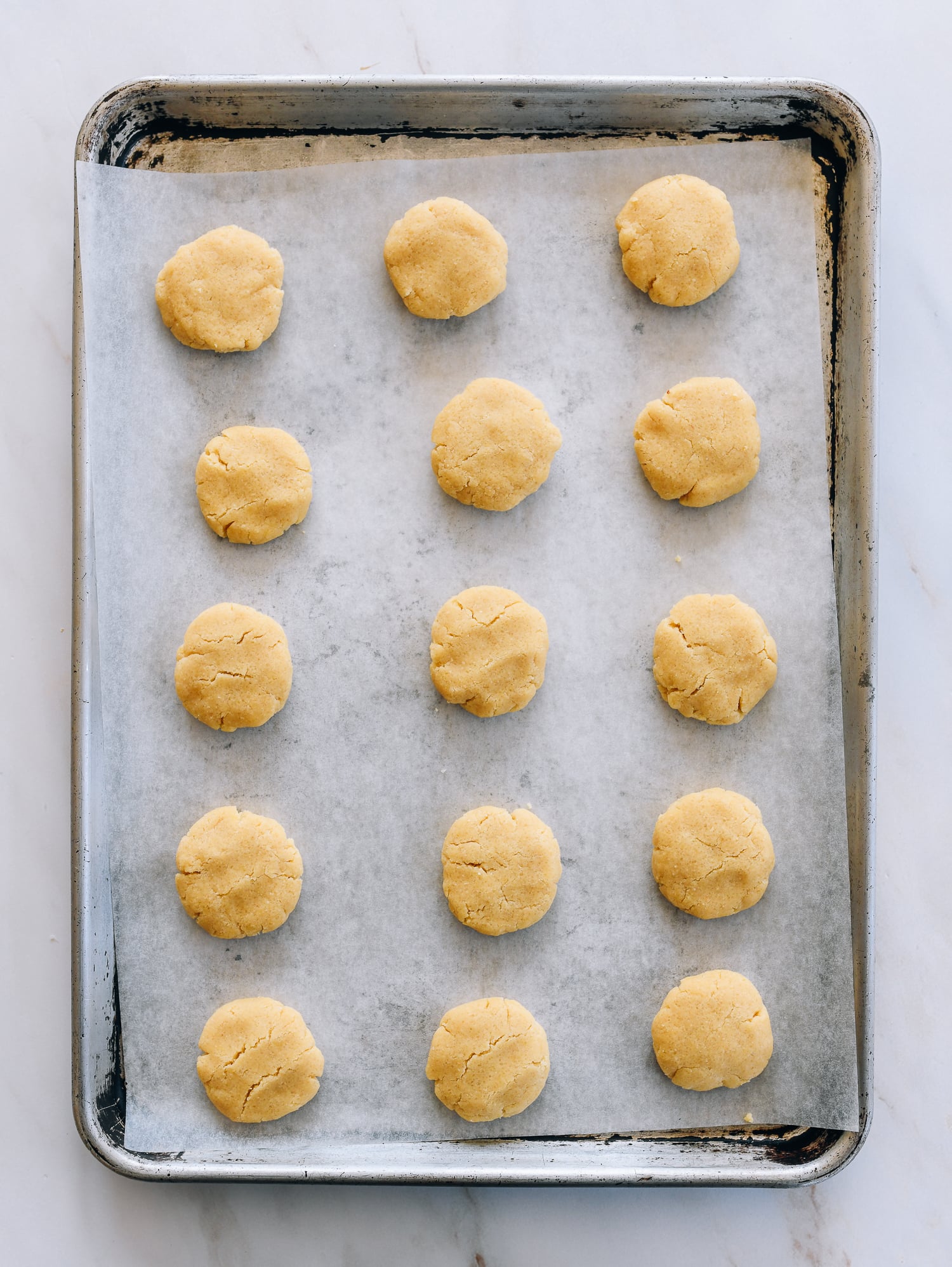 almond cookies on sheet pan