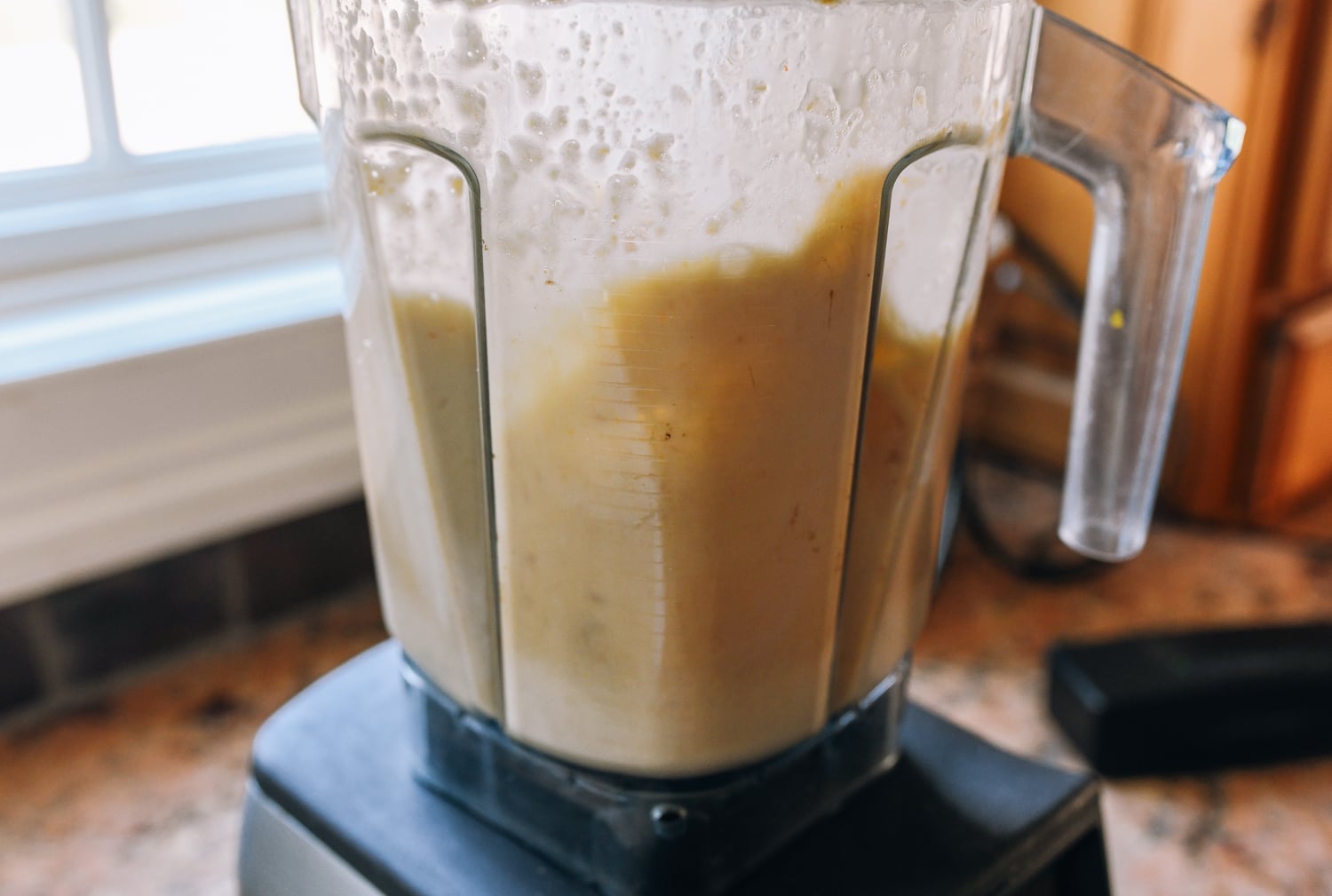 blended chickpeas and water in blender