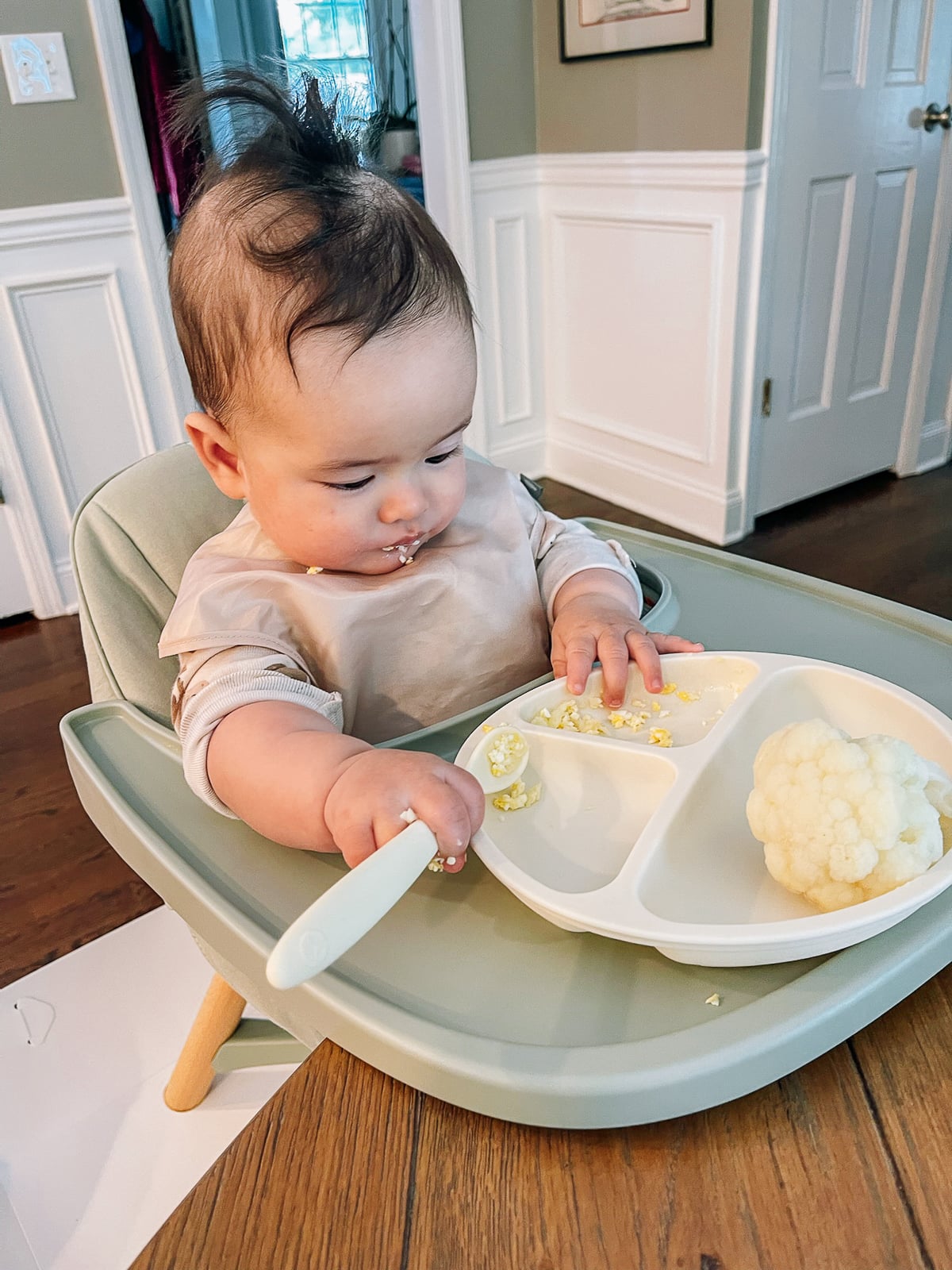 Ethan holding spoon