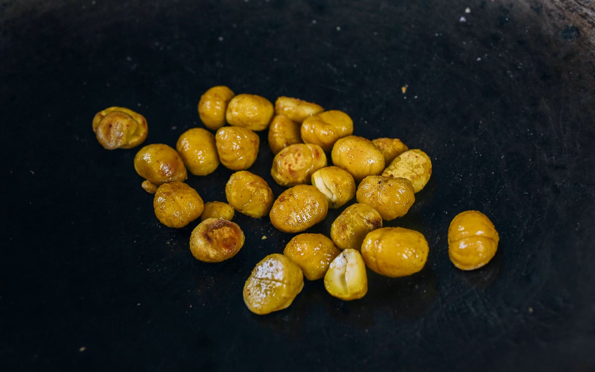 cooking peeled chestnuts in wok