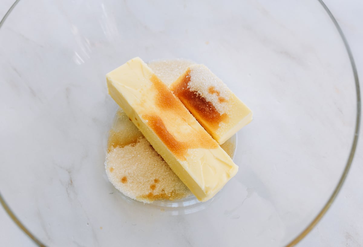 butter, sugar, and vanilla in glass bowl