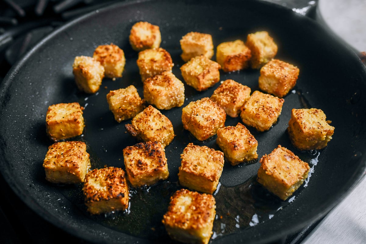 golden and crisp pan-fried cubes of tofu