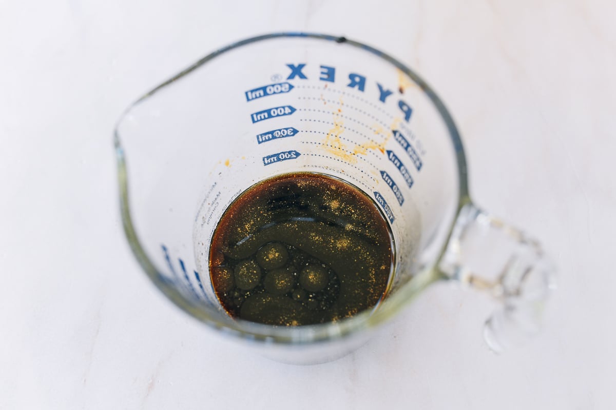 sauce mixture in measuring cup
