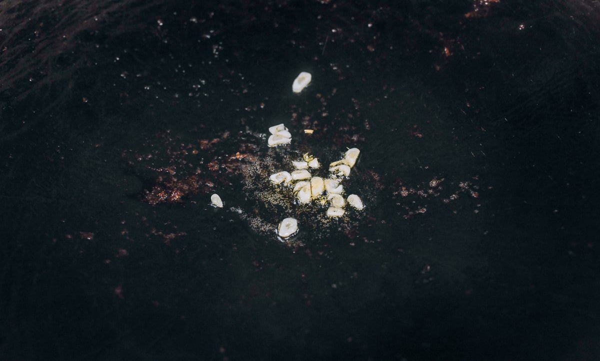 chopped garlic in wok