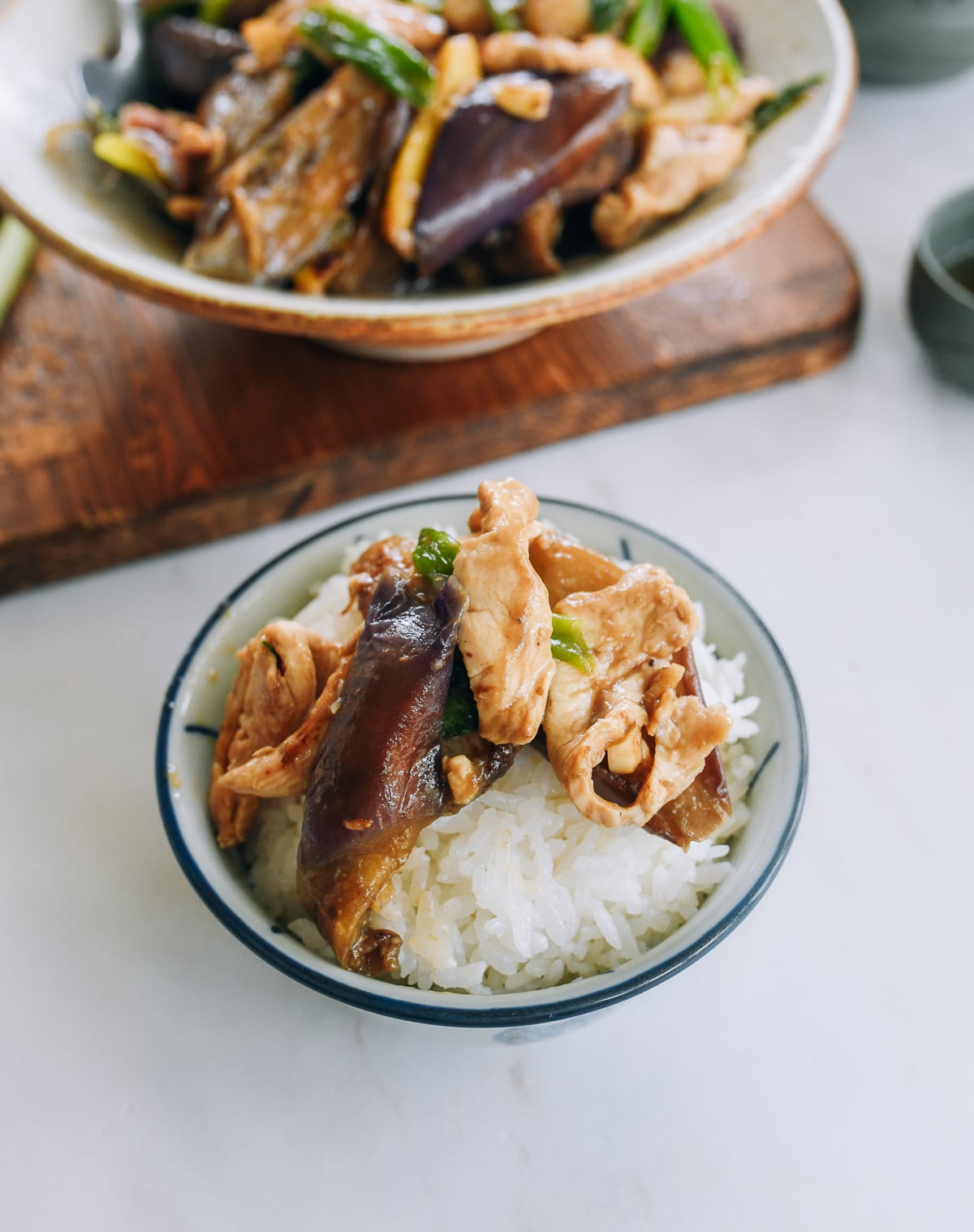 Eggplant and chicken over steamed rice