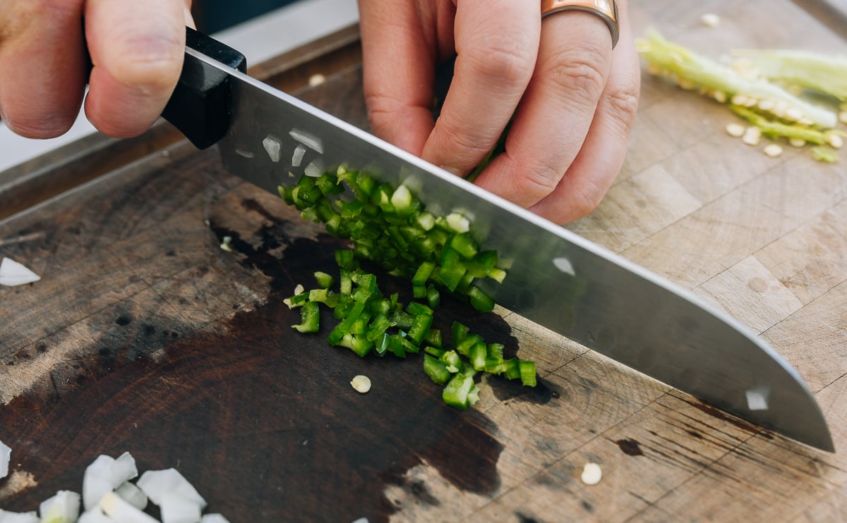 chopping jalapeno peppers