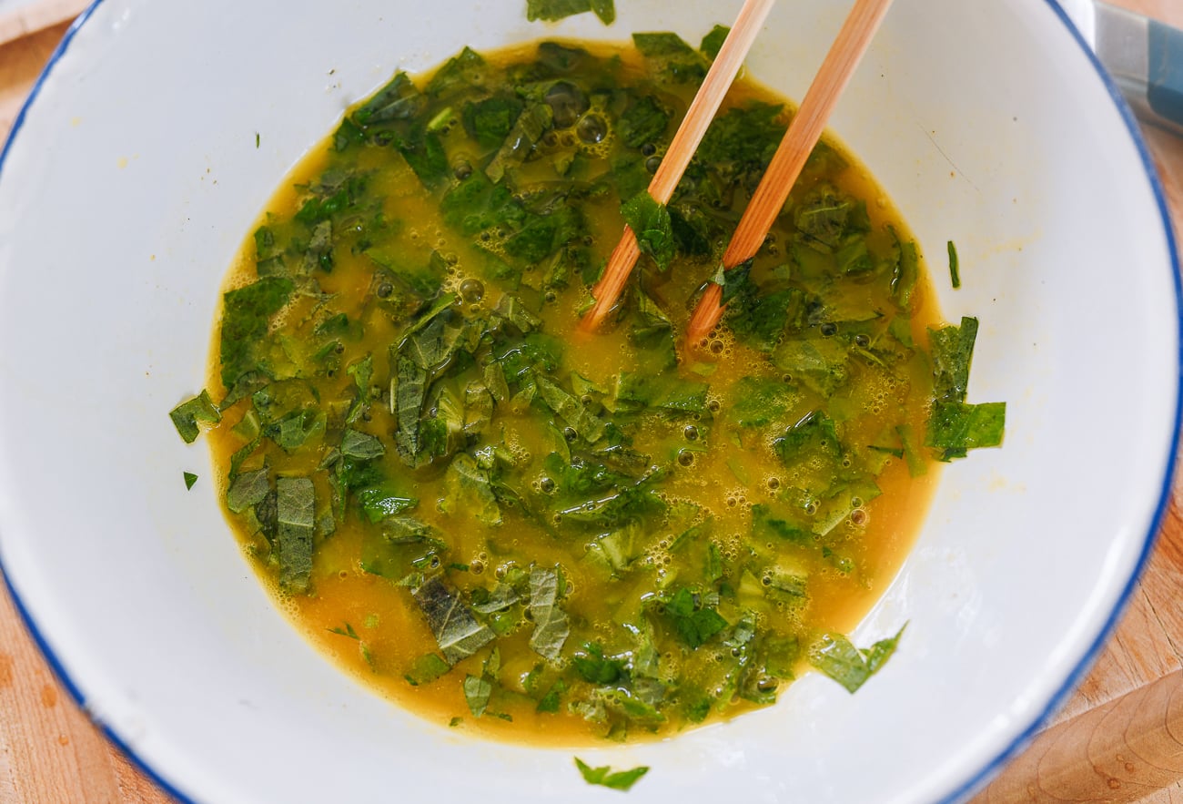 chopped shiso leaves added to beaten eggs